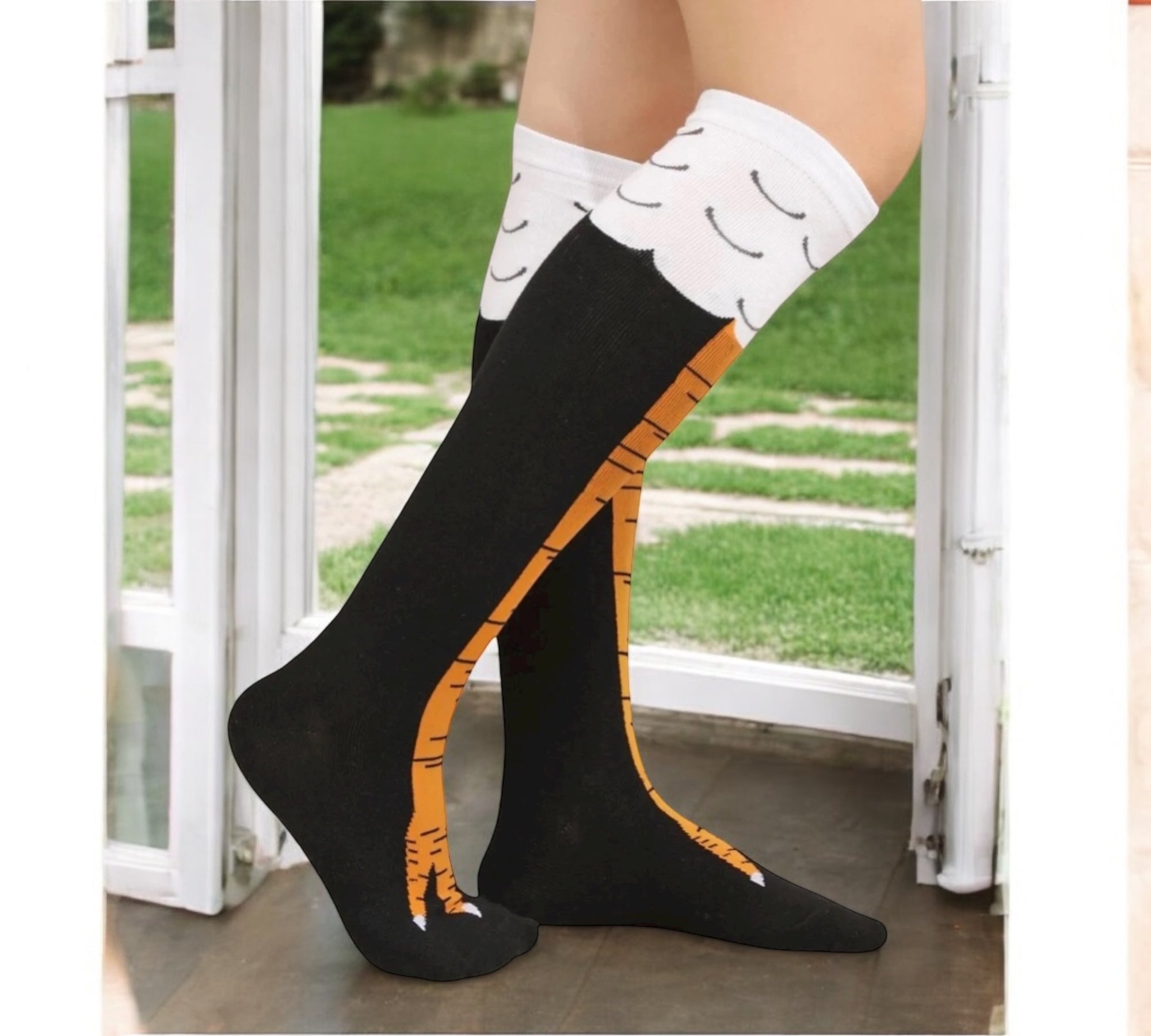 Hilarious chicken leg knee-high socks worn for fun, cozy comfort during Thanksgiving.
