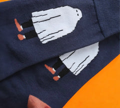 Close-up of Ghostly Chic Halloween Socks showcasing the playful ghost pattern and vibrant terracotta heel detail.